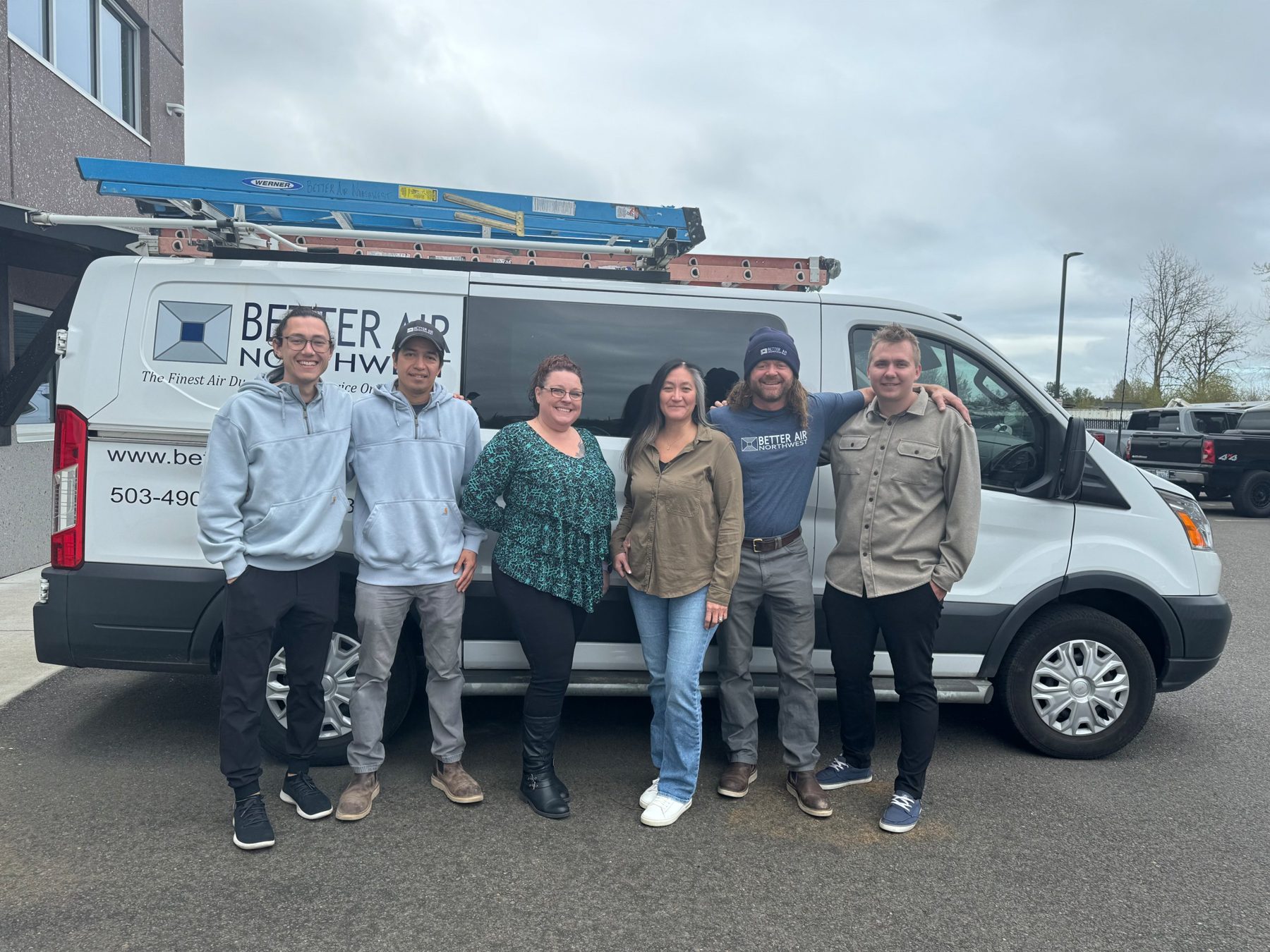 Better Air NW team with Andy Bergmann in front of a company van