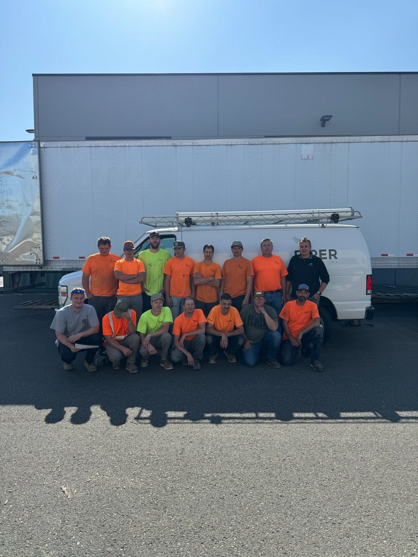 Piper Mechanical crew in front of a company van