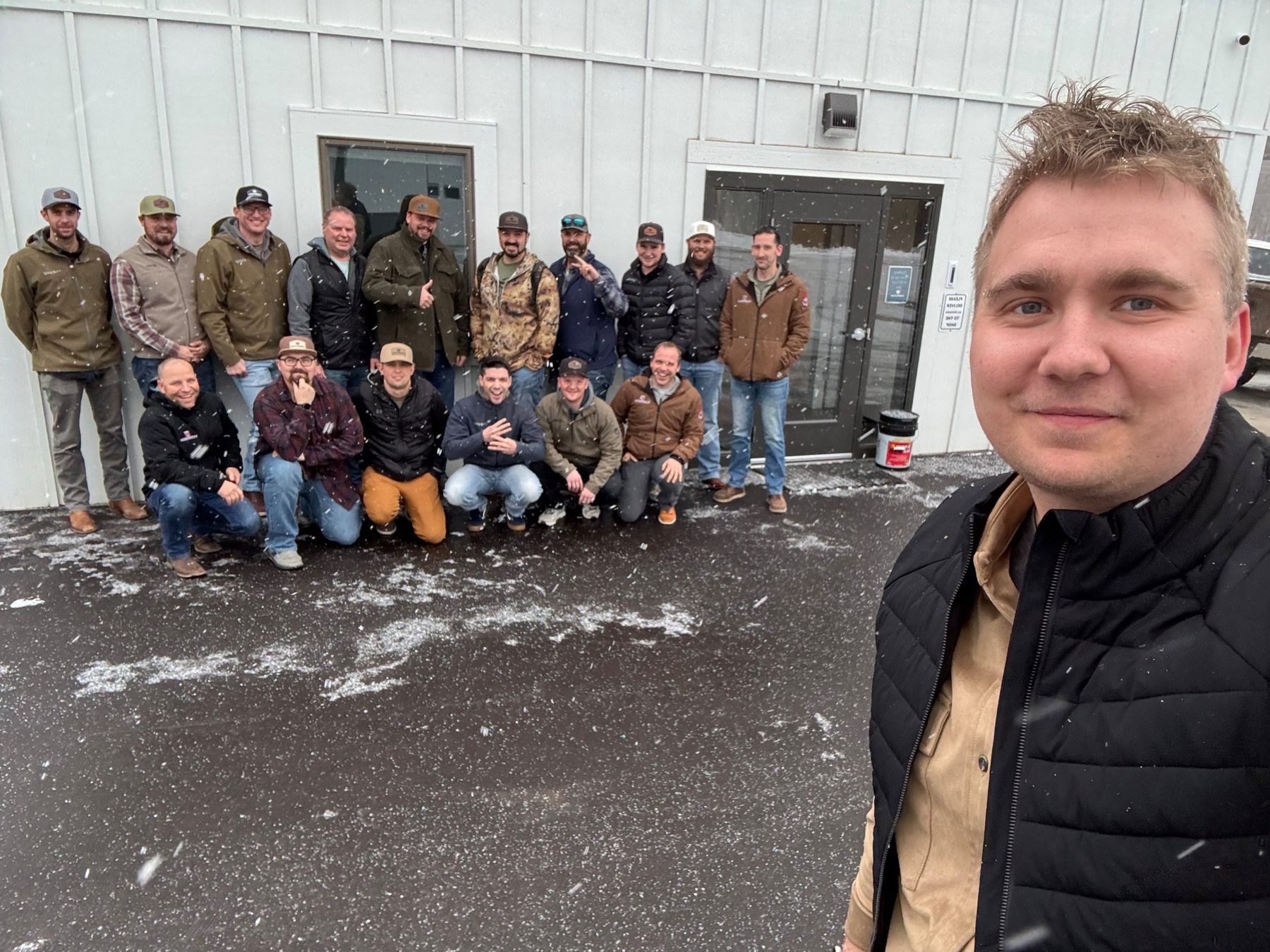 Andy Bergmann with the Wescom group outside in the snow